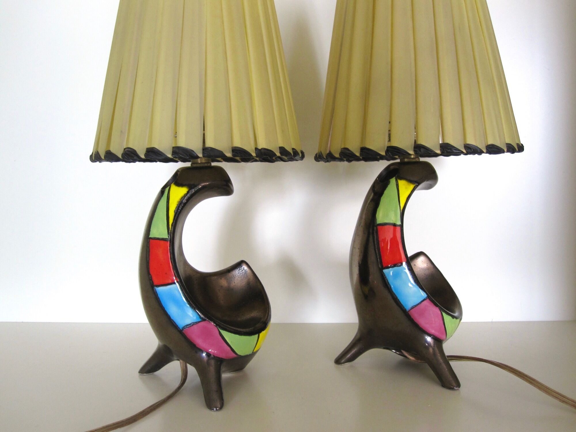 Pair of ceramic tripod lamps from the 50s