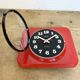 Vintage red bakelite wall clock from prim, 1970s