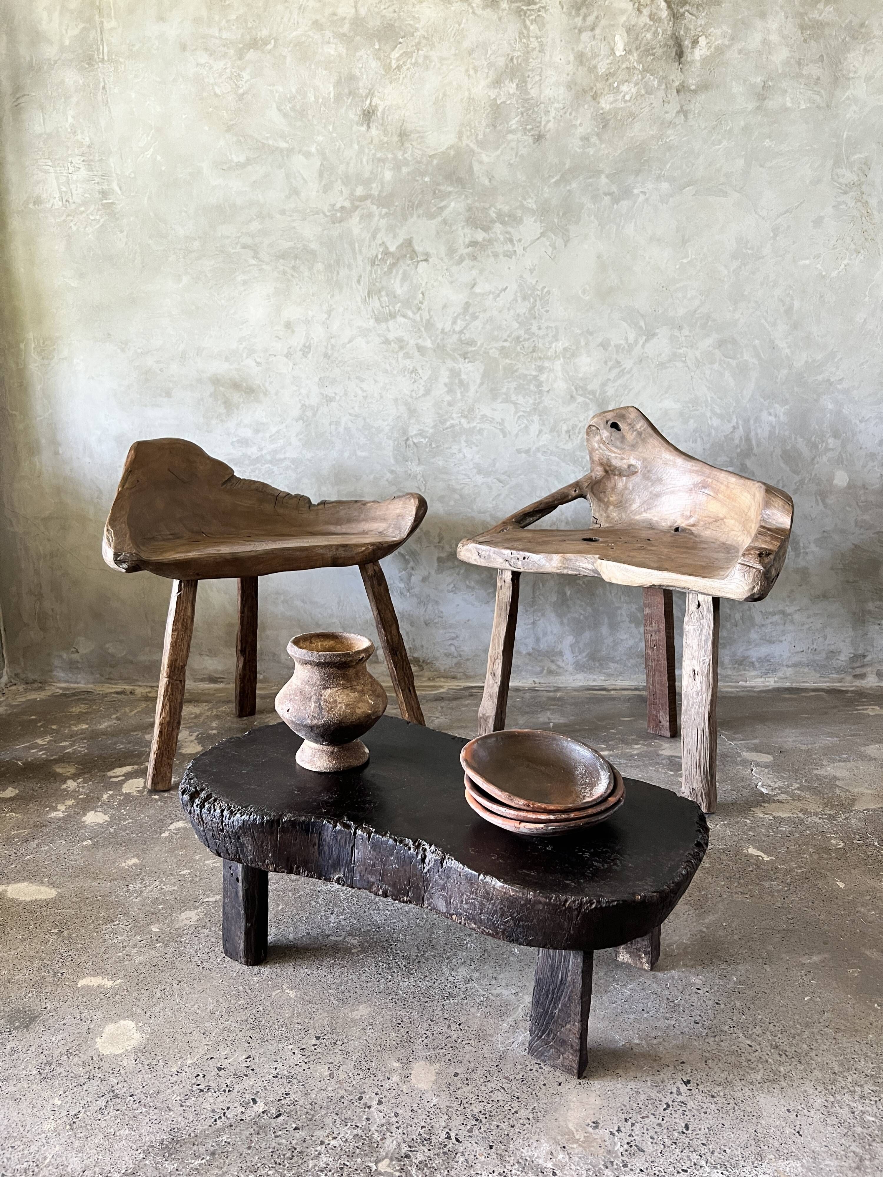 Small old Asian wooden coffee table in Japanese style, kidney-shaped top