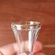 Antique footed liqueur glasses with gold trim from the early 20th century.
