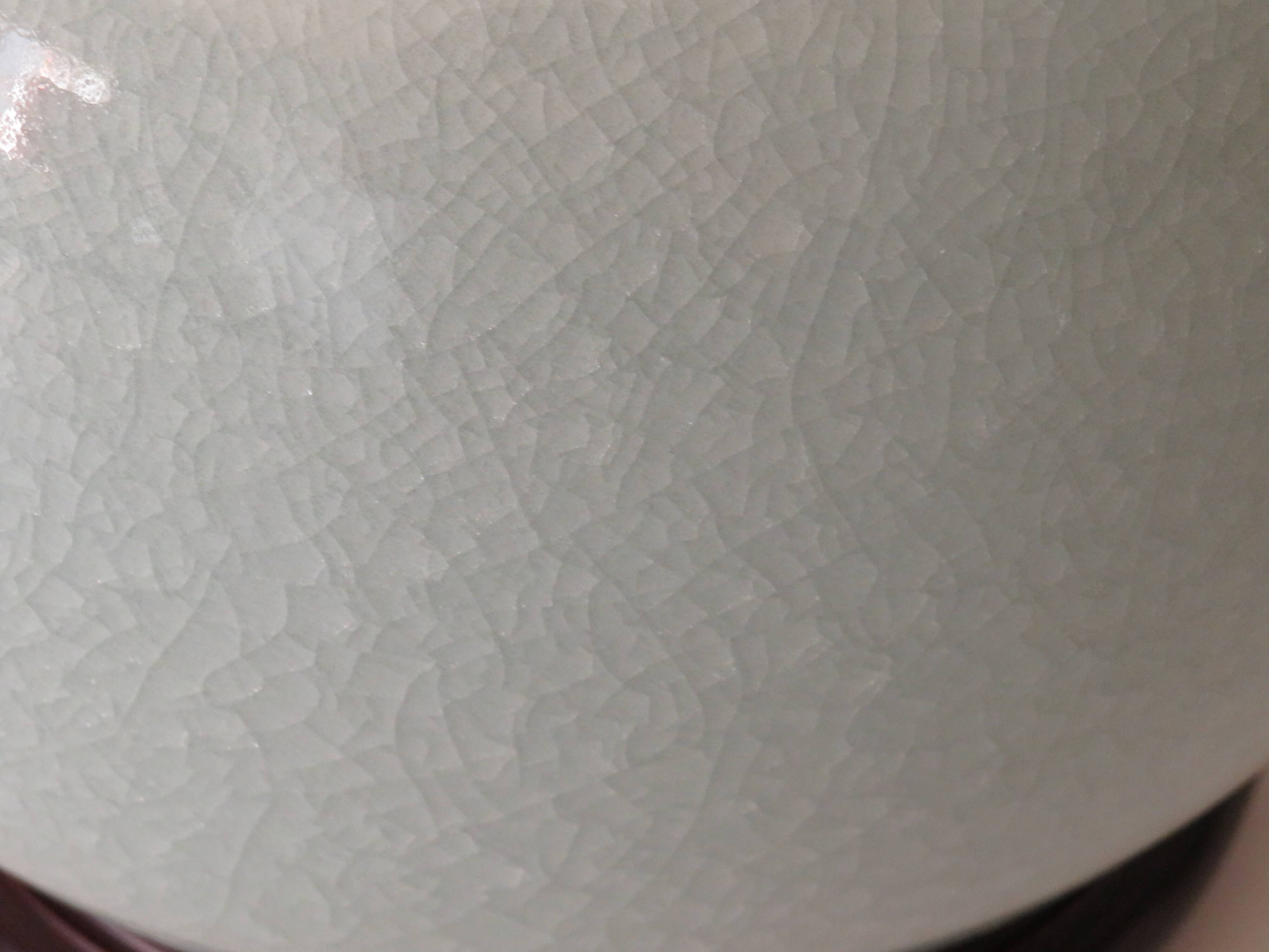 Celadon-colored cracked ceramic table lamp with new personalized lampshade.
