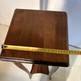 Vintage dark wood side table with curved base