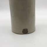 Old hot water bottle in glazed stoneware, gray color.