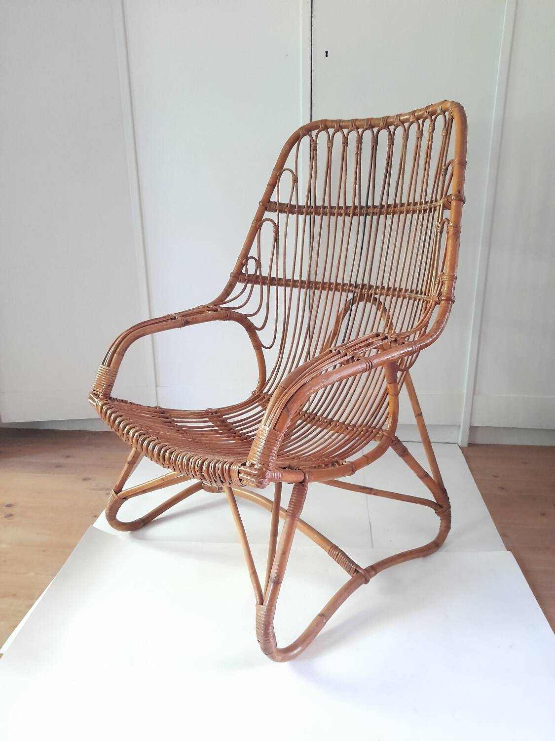 Large vintage wicker armchair