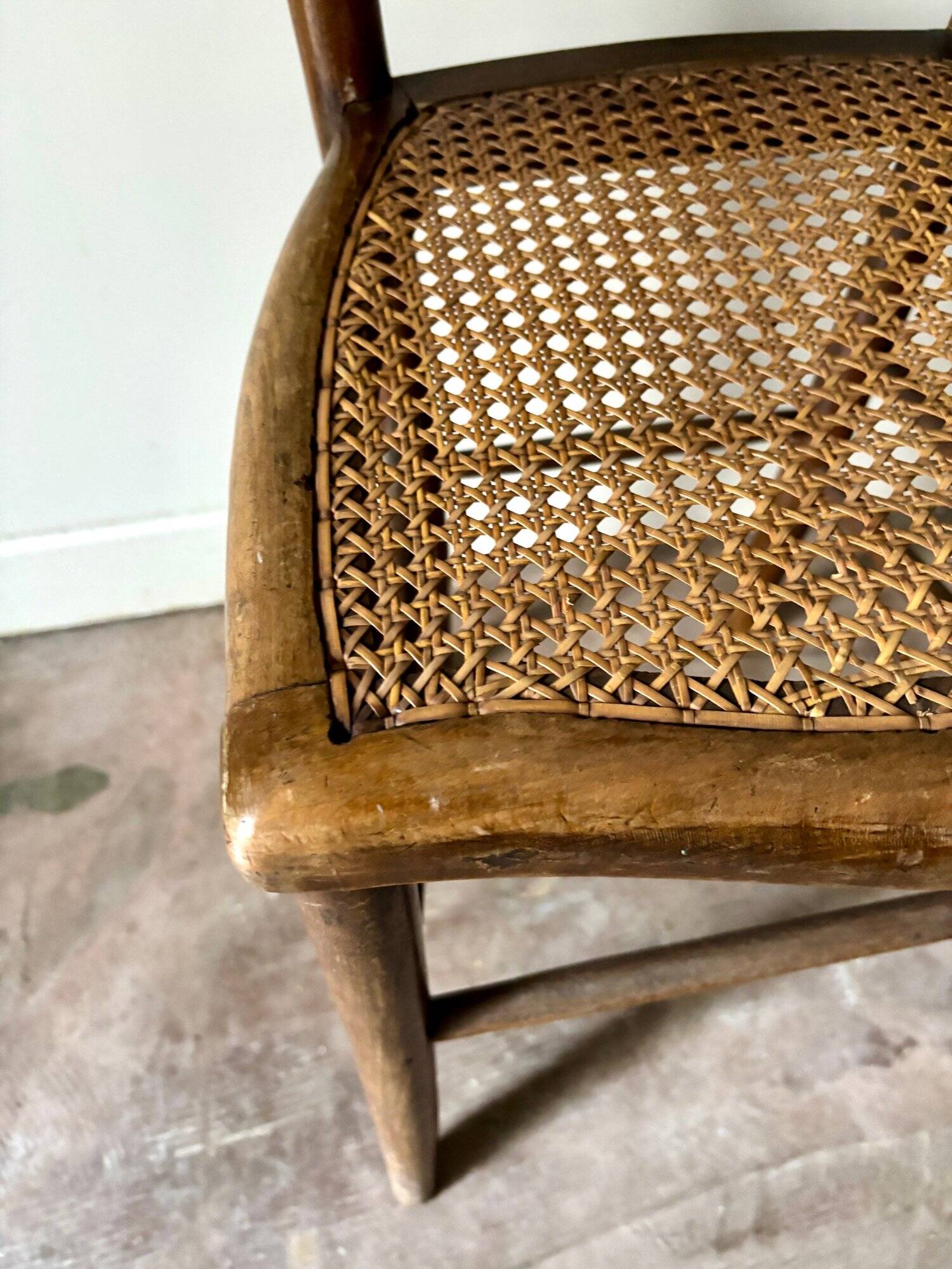 Wooden and cane bistro chair