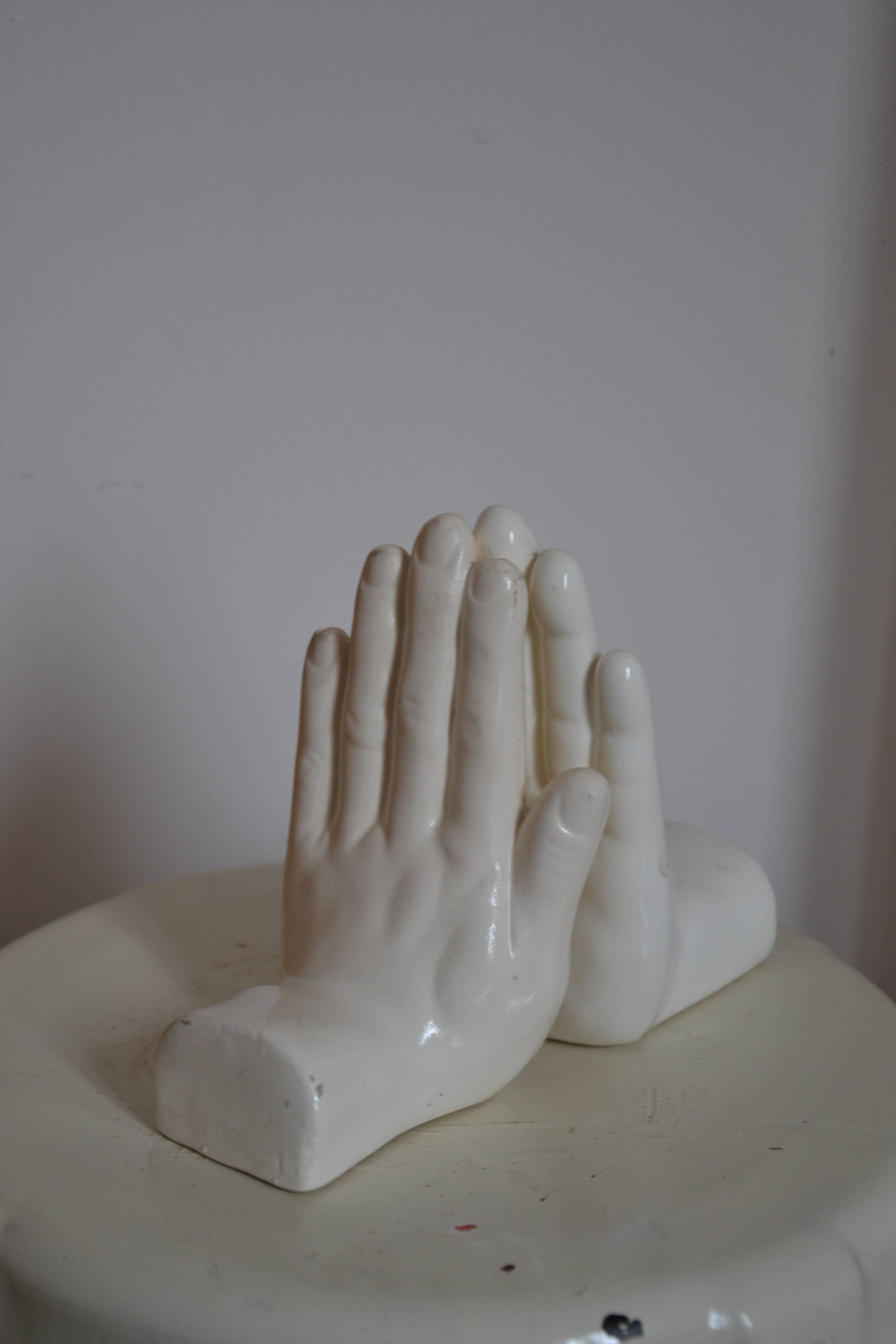 Handends in the shape of vintage white ceramic