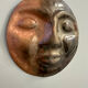 Sculpture face in embossed enamelled brass from the 1960s.