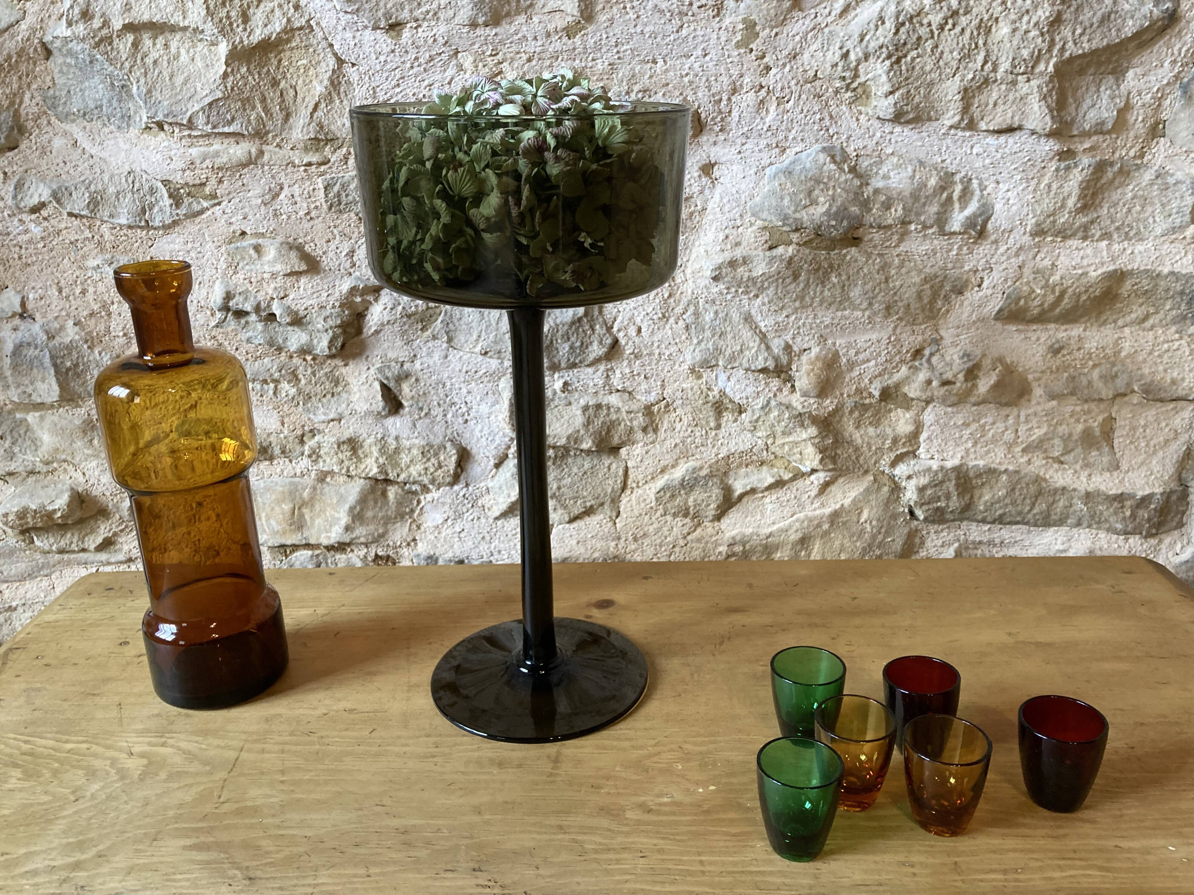 Large bowl in moss green tinted blown glass