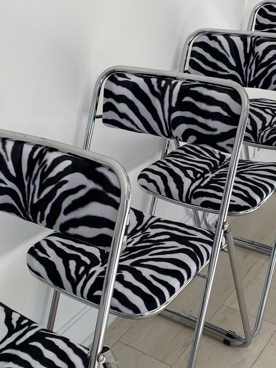 6 folding chairs in metal and zebra-patterned fabric, 1970s