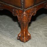 Chesterfield leather canapé with claw and ball feet by Howard & Son, Victorian era.