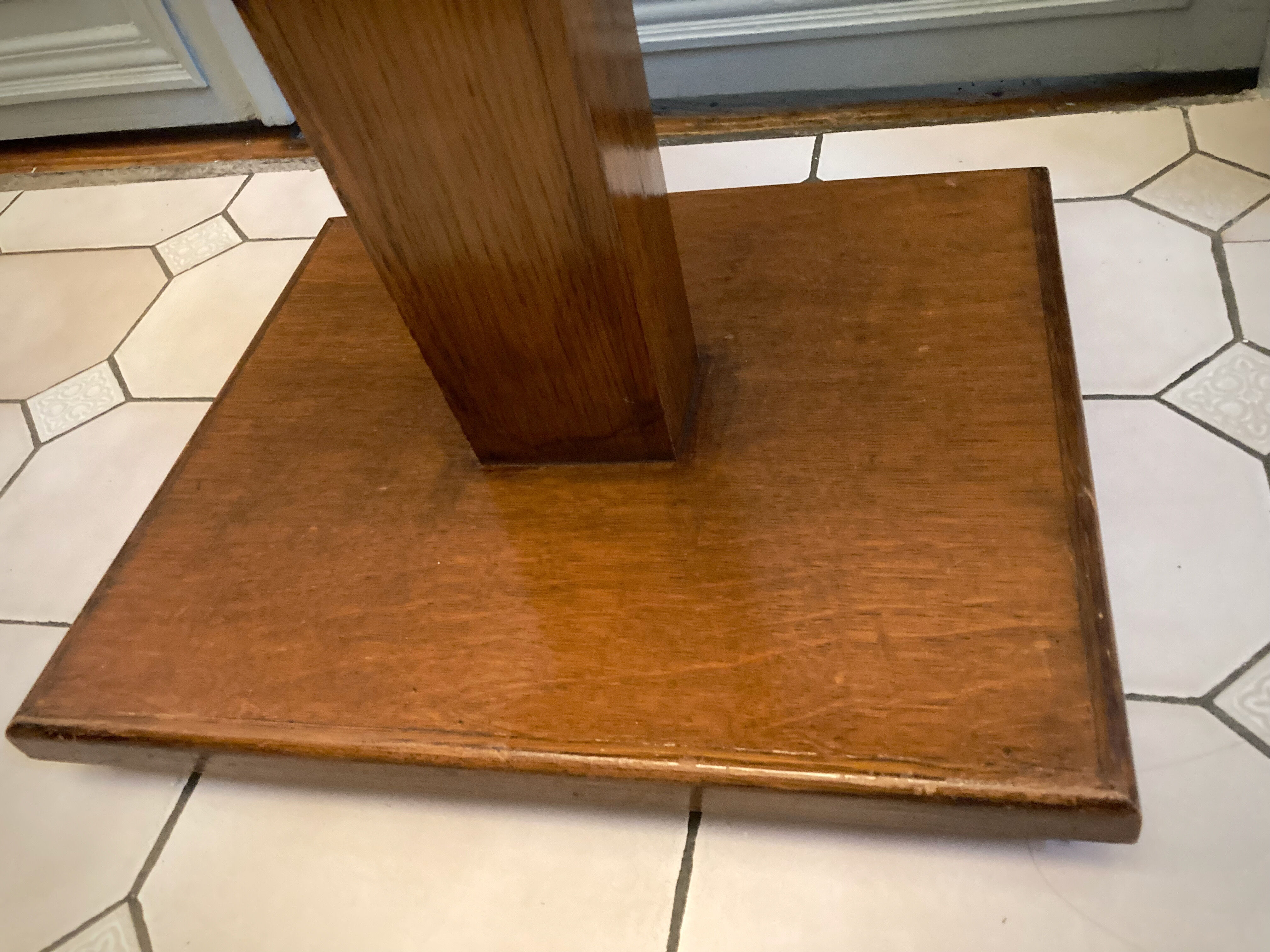 Square pedestal table with central foot 1930