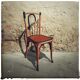 Set of mismatched bistro chairs