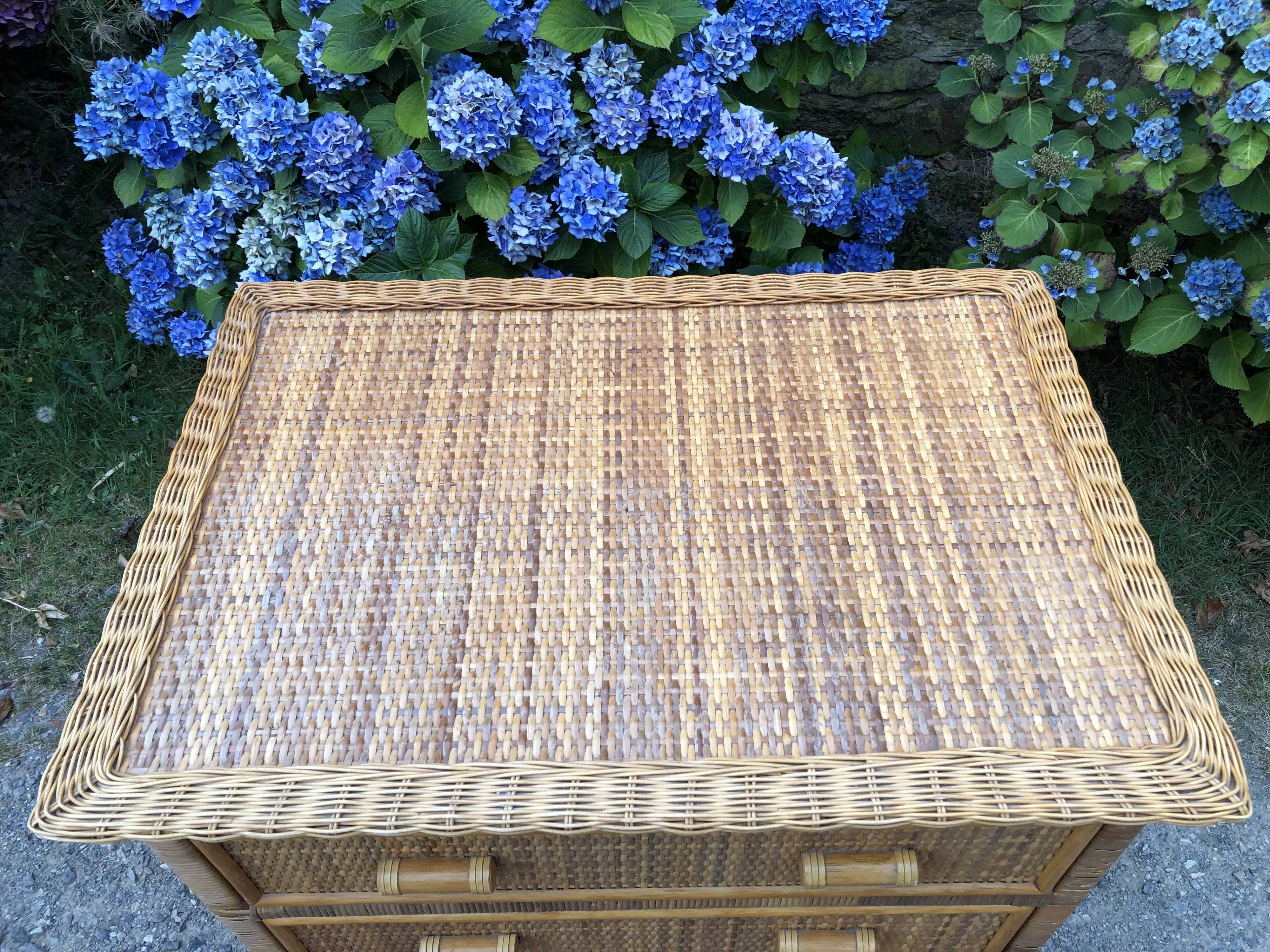 Vintage rattan chest of drawers has 3 drawers.