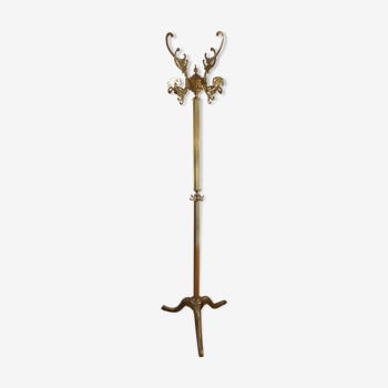 Turning brass coat rack