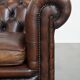 Dark brown English cowhide leather chesterfield armchair
