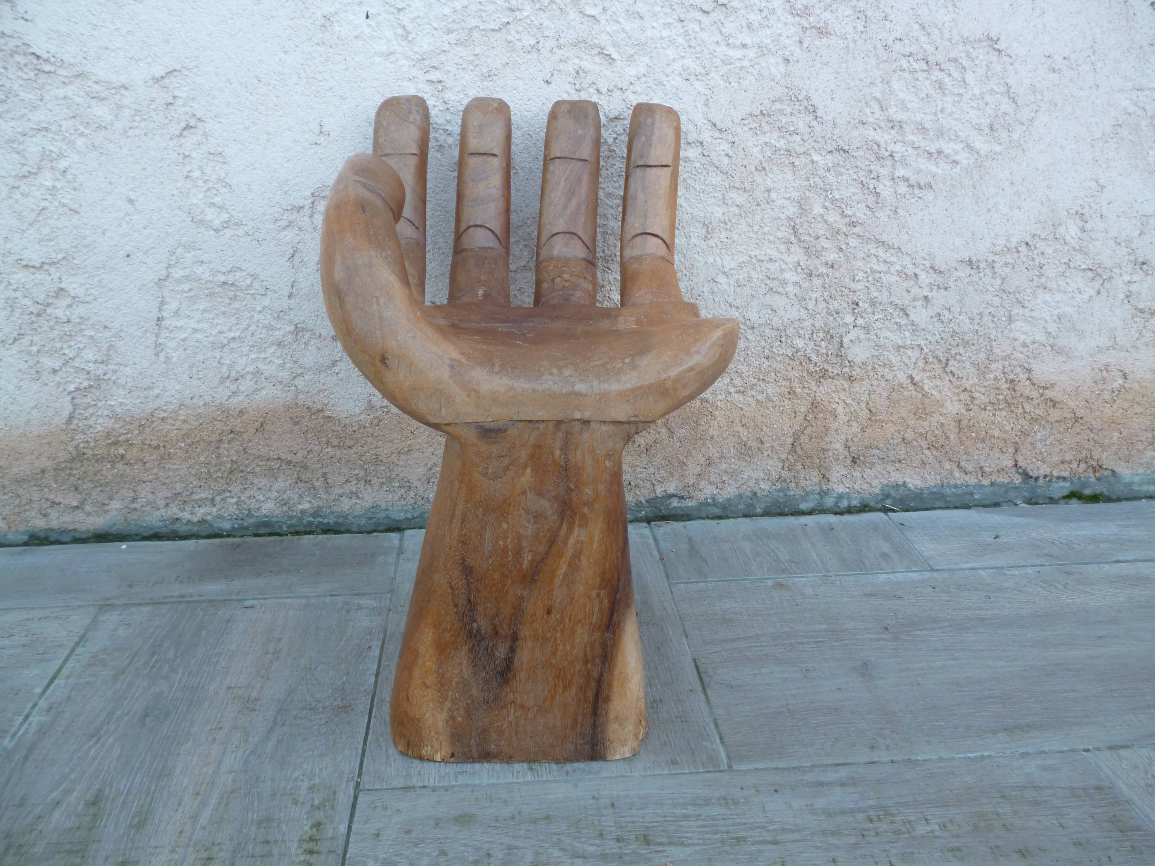 Vintage wooden hand-shaped chair