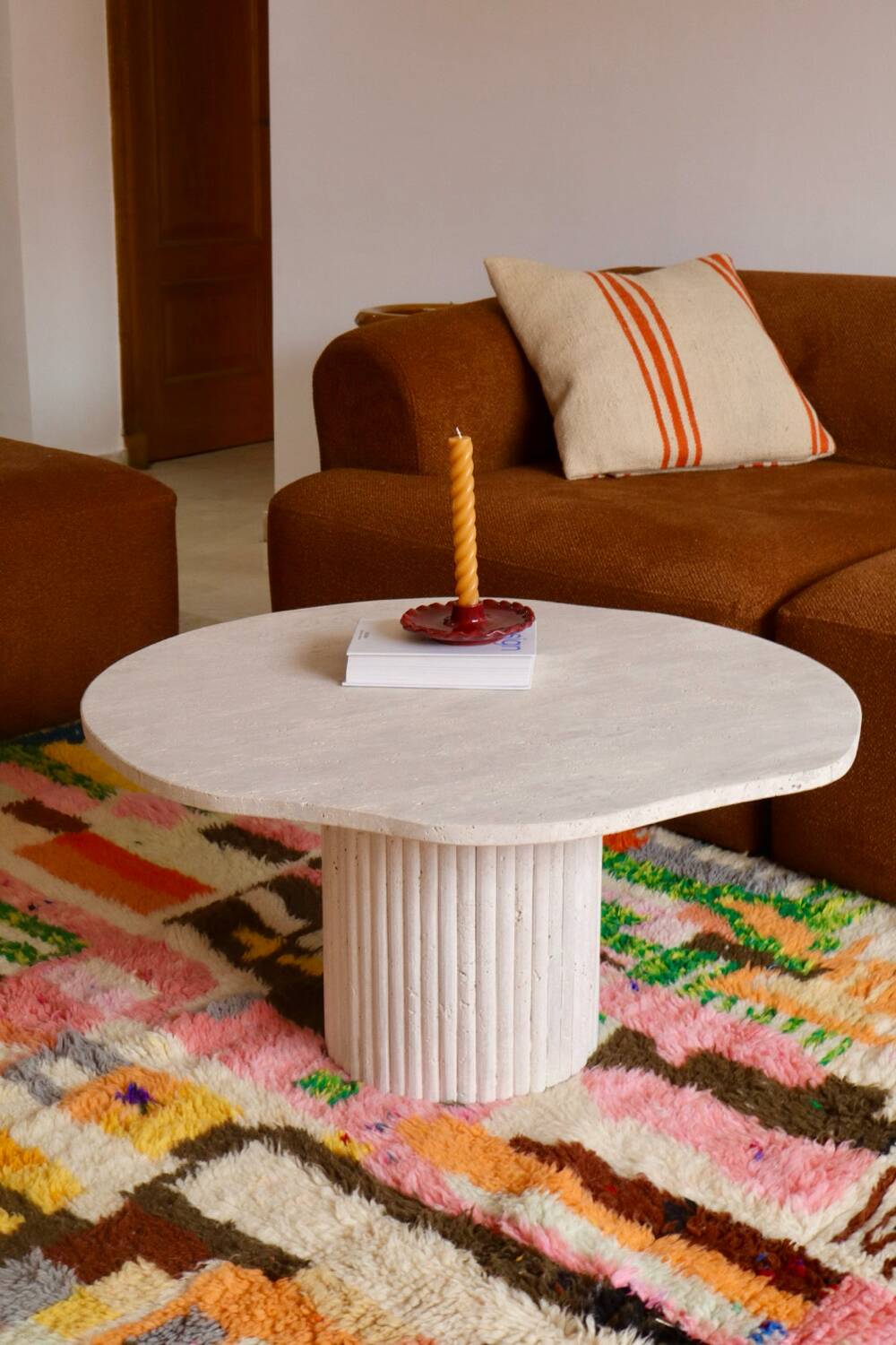 Organic shape travertine coffee table