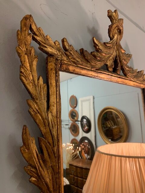 Carved gilded wood mirror