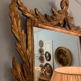 Miroir en bois doré sculpté
