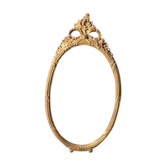 Cadre ovale en bronze doré au ruban XIXème