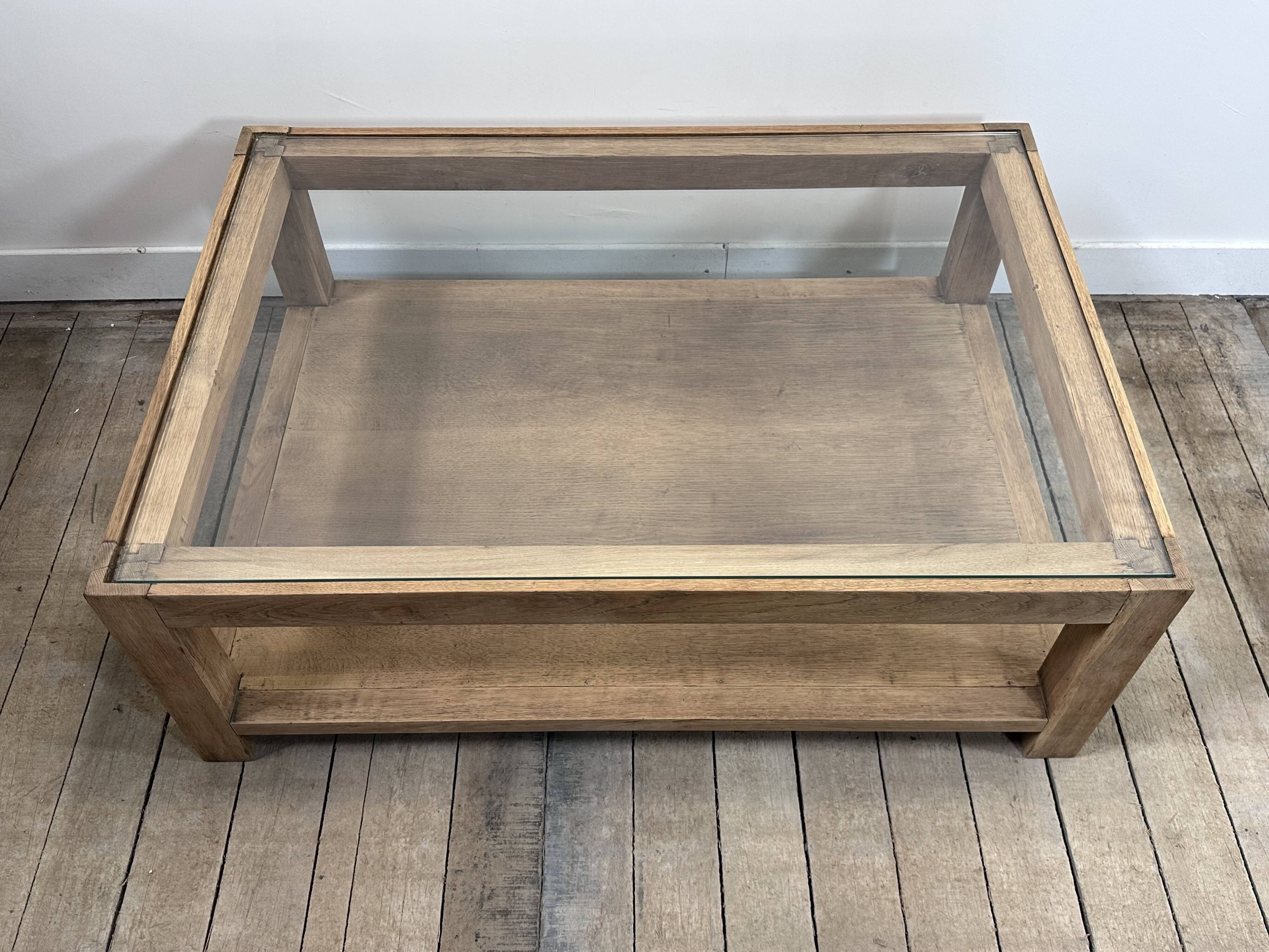 Brutalist oak coffee table with a glass top