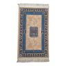 Beige and blue Persian rug