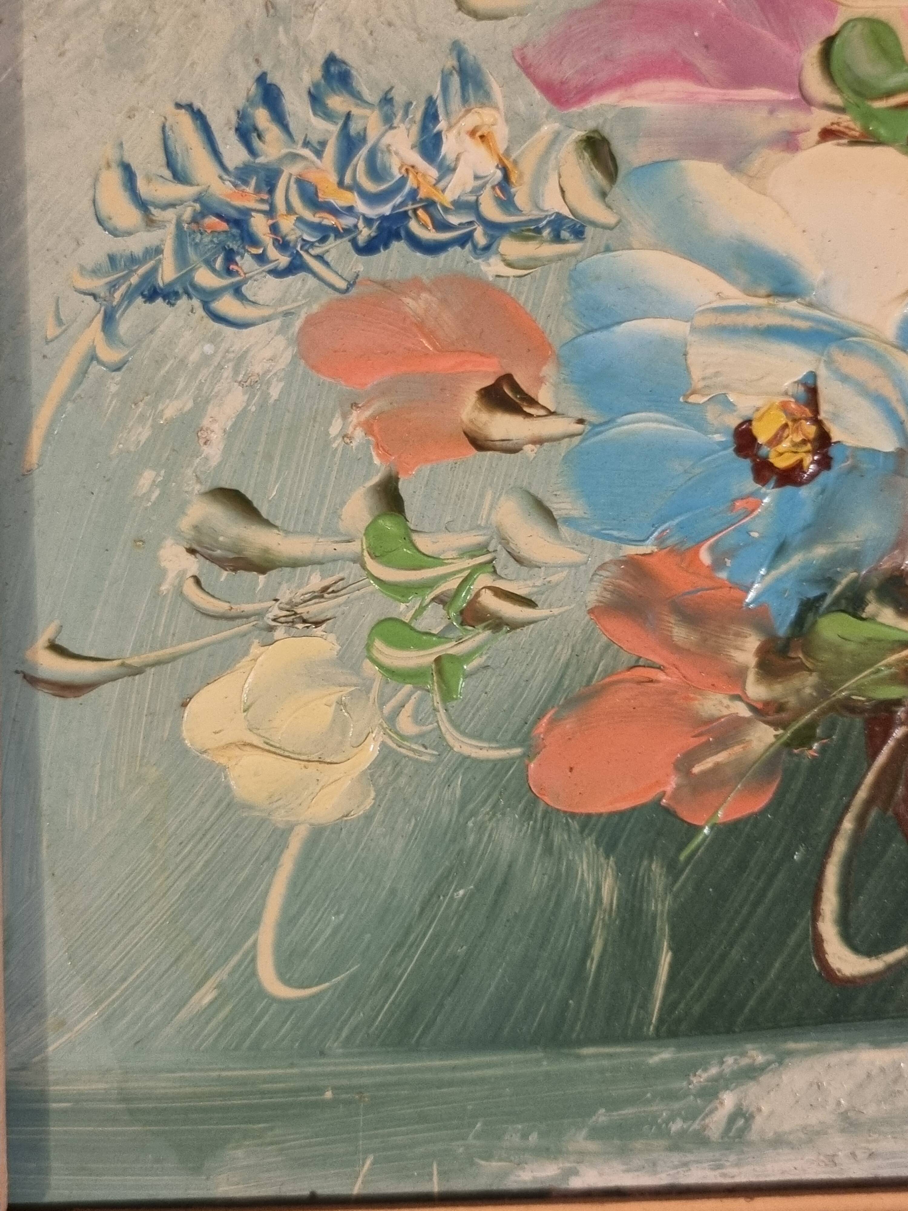 Oil painting of a bouquet of flowers.