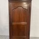 Louis Philippe style bonnetière in solid cherry wood, 19th century
