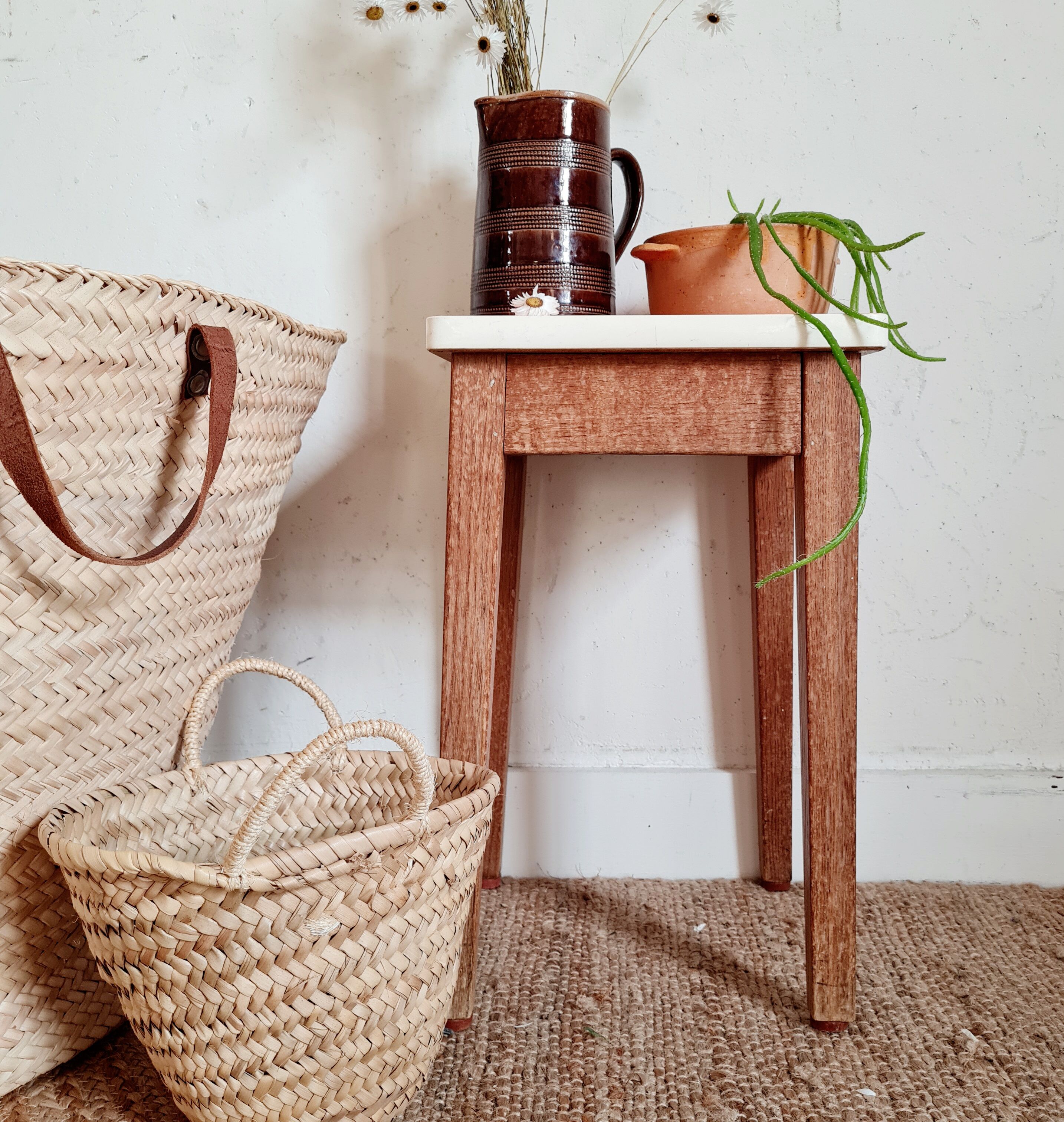 Wooden wax stool and orange formica