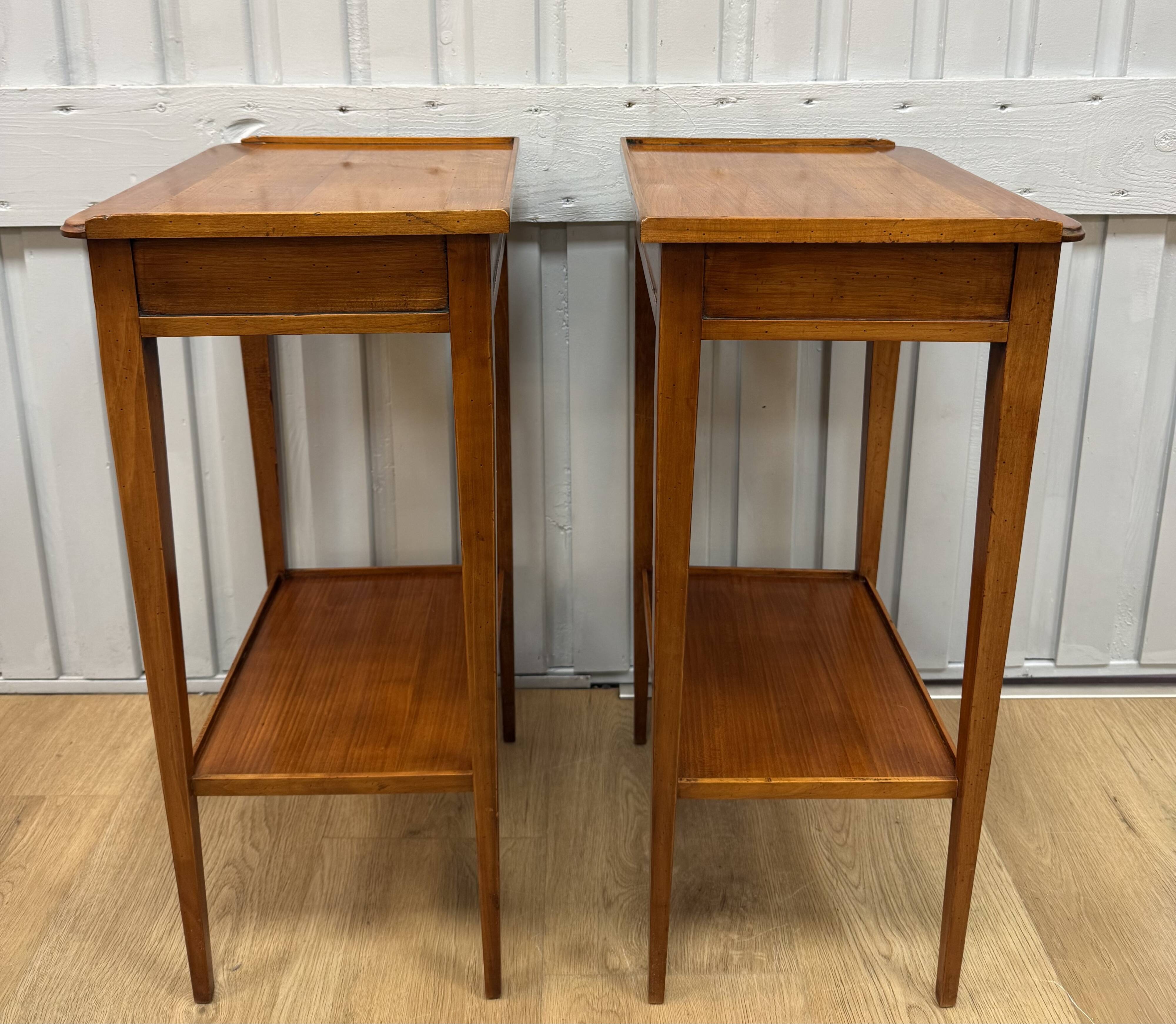 Pair of small side tables in cherry wood.