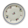 Round serving dish "lourioux foëcy" with flower motifs.
