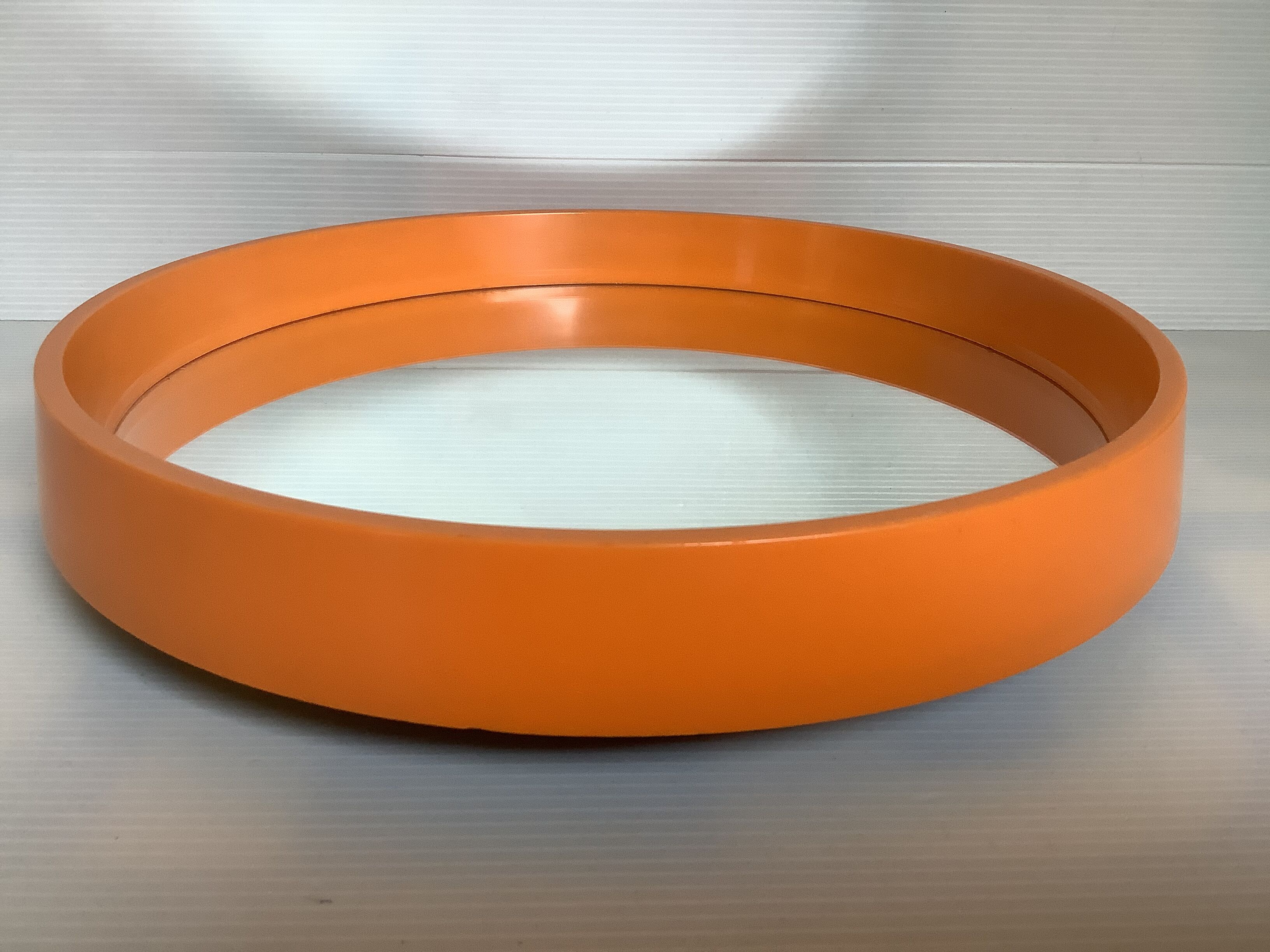 Old vintage orange round mirror