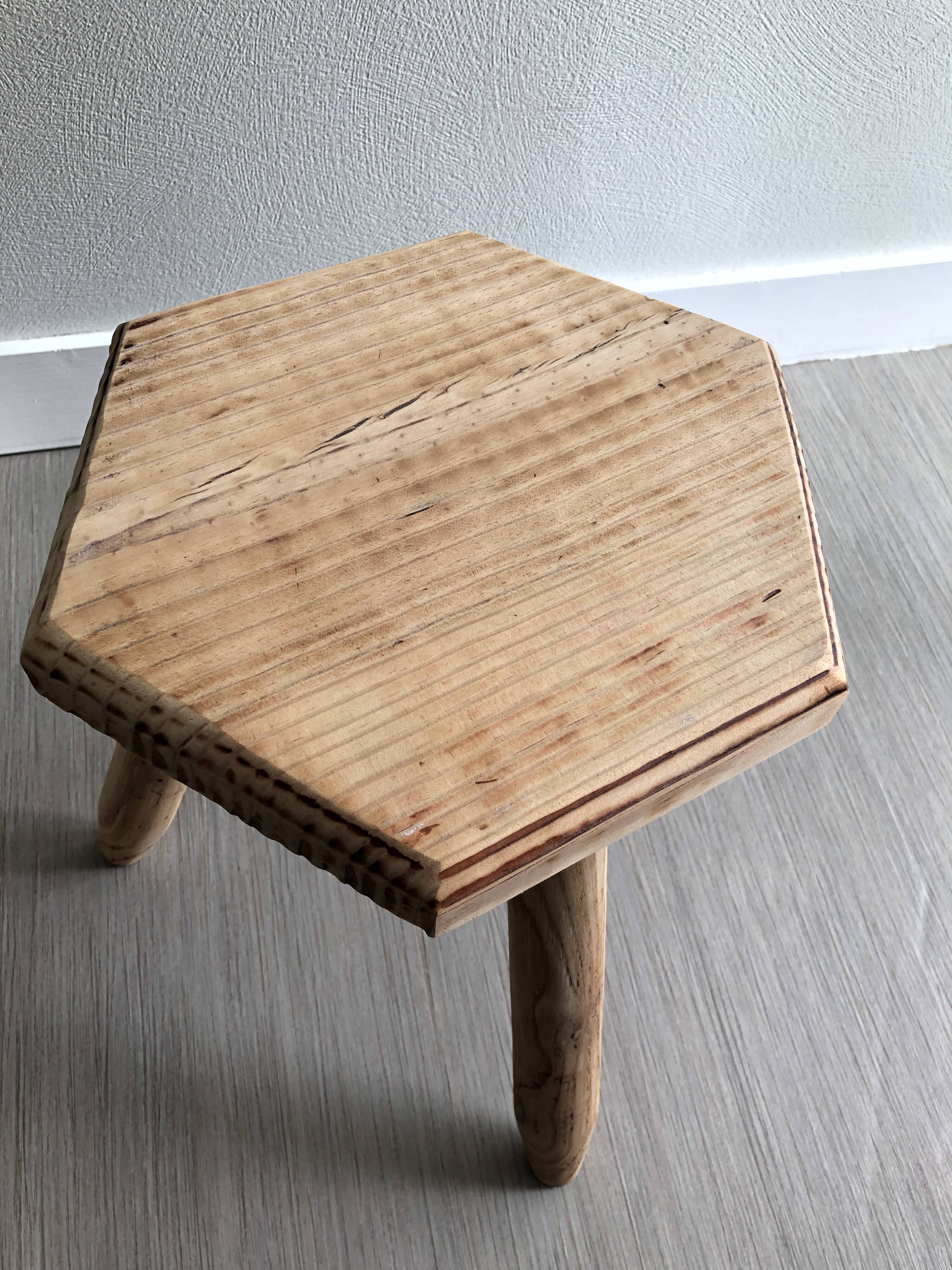 Raw wood tripod tripod