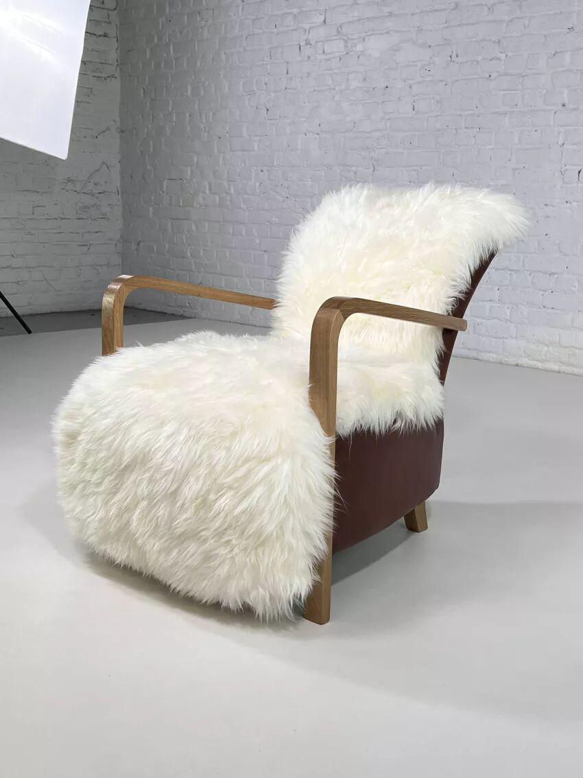 Scandinavian style armchair in leather and hide