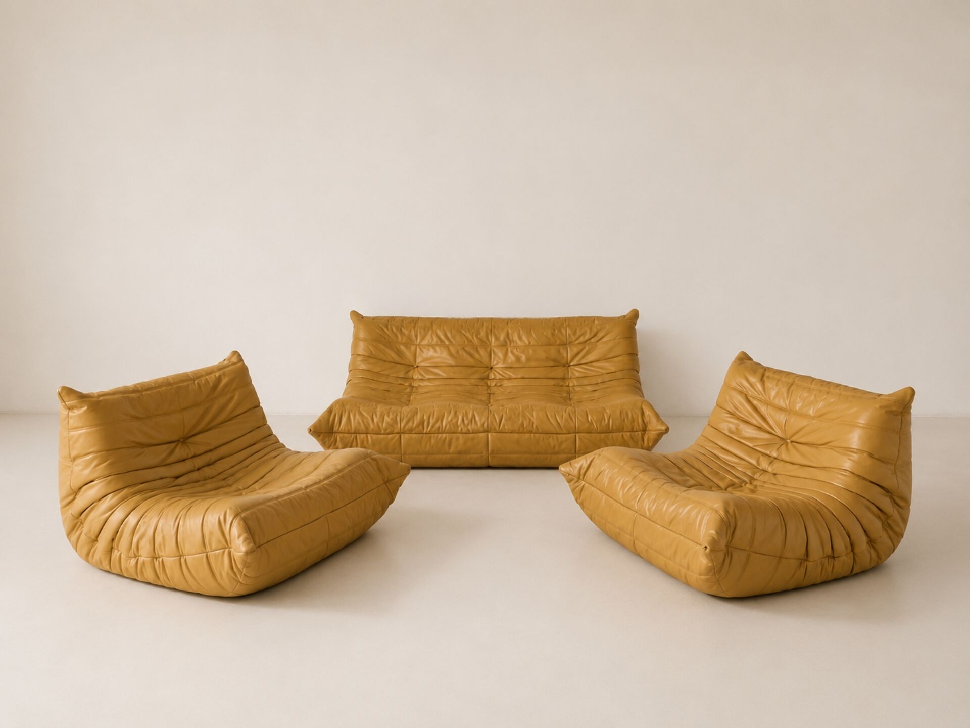 Ligne Roset Togo vintage honey yellow leather – 3-seater + 2 armchairs