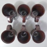 coffee service in iridescent stoneware cups and vintage sugar bowl