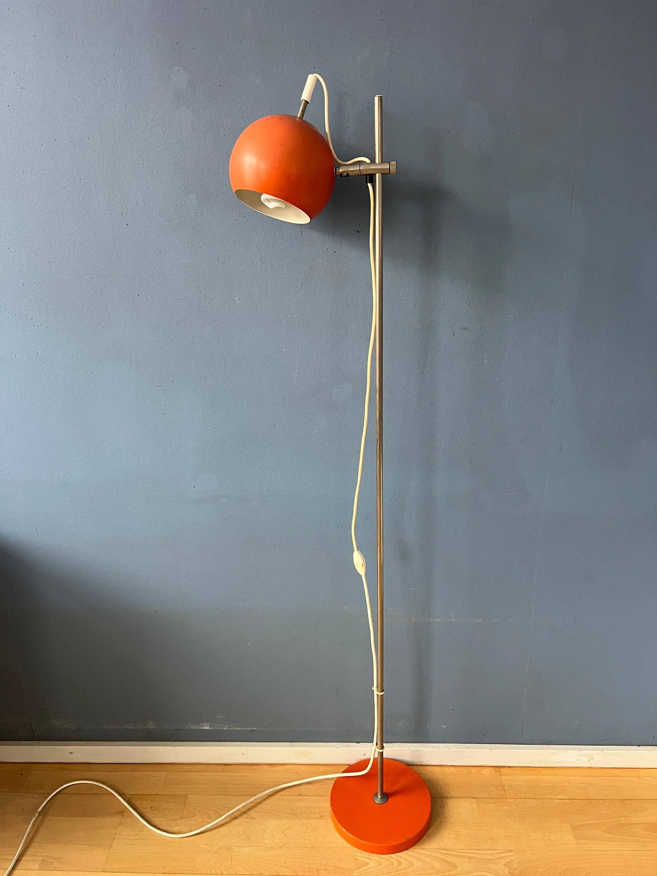 Mid-Century orange floor lamp with "eyeball" shade