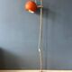 Mid-Century orange floor lamp with "eyeball" shade