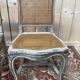 Suite de 4 chaises cannées de style Louis XV rechampi