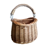 Covered rattan basket for lunch on 50s grass