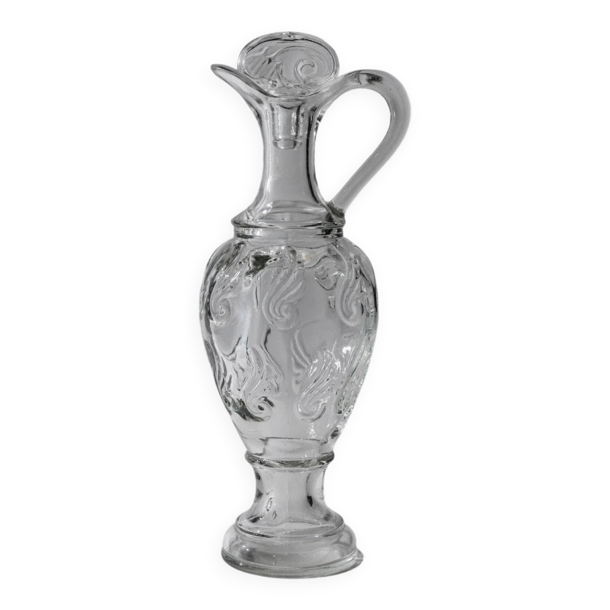 Vintage pressed glass carafe from the 1960s, clear sculptural glass with textured patterns and a stopper.