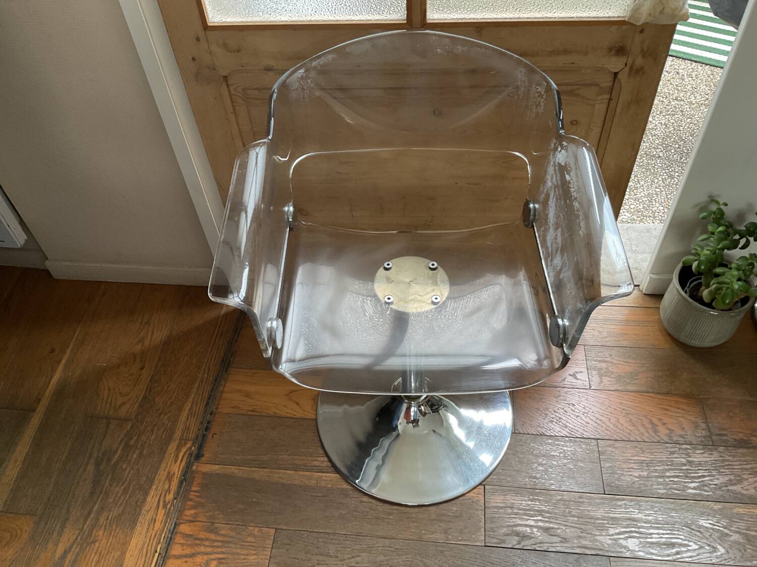 Plexiglas armchair with steel base from the 90s