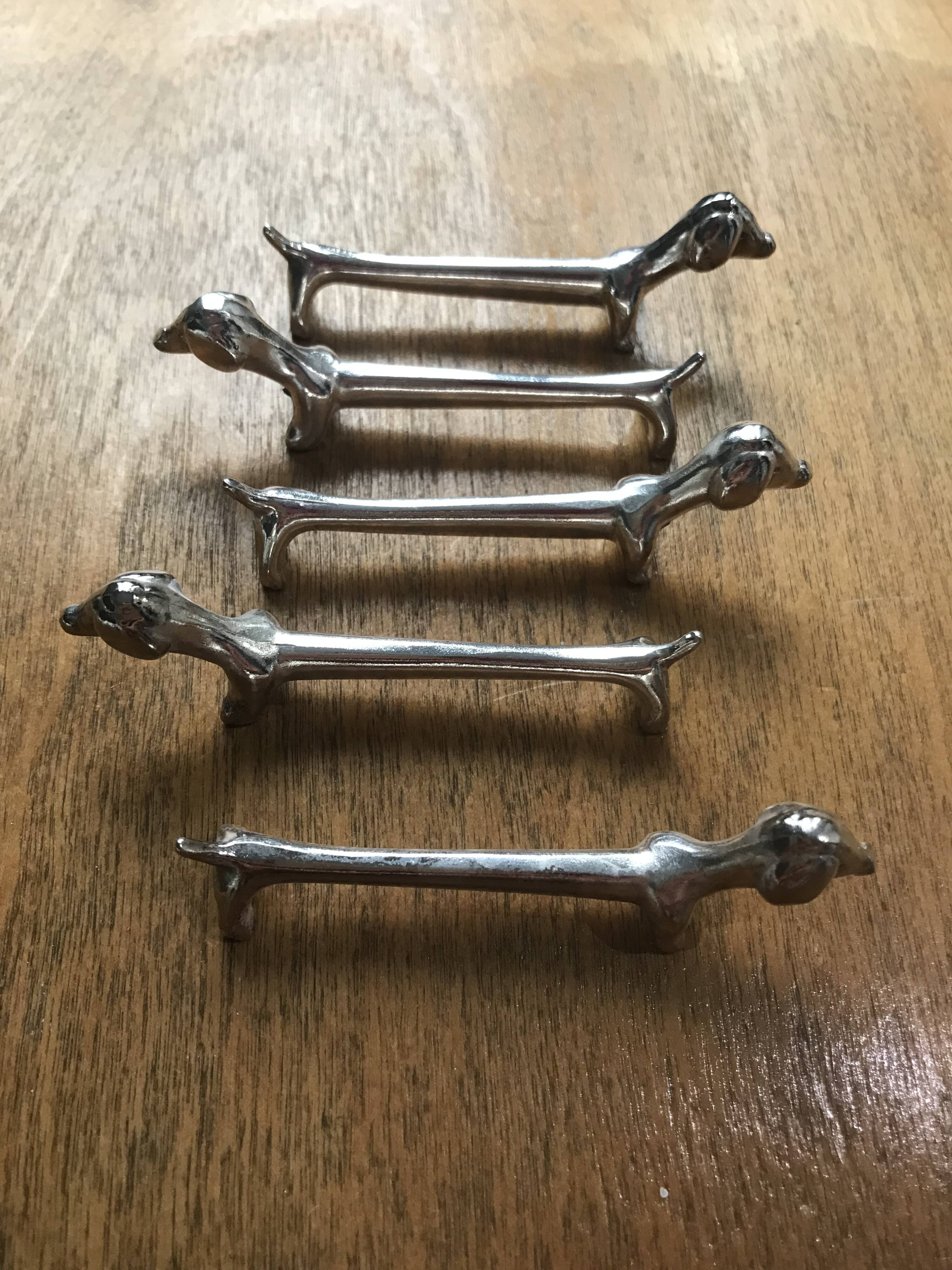 Set of five vintage basset hound knife holders