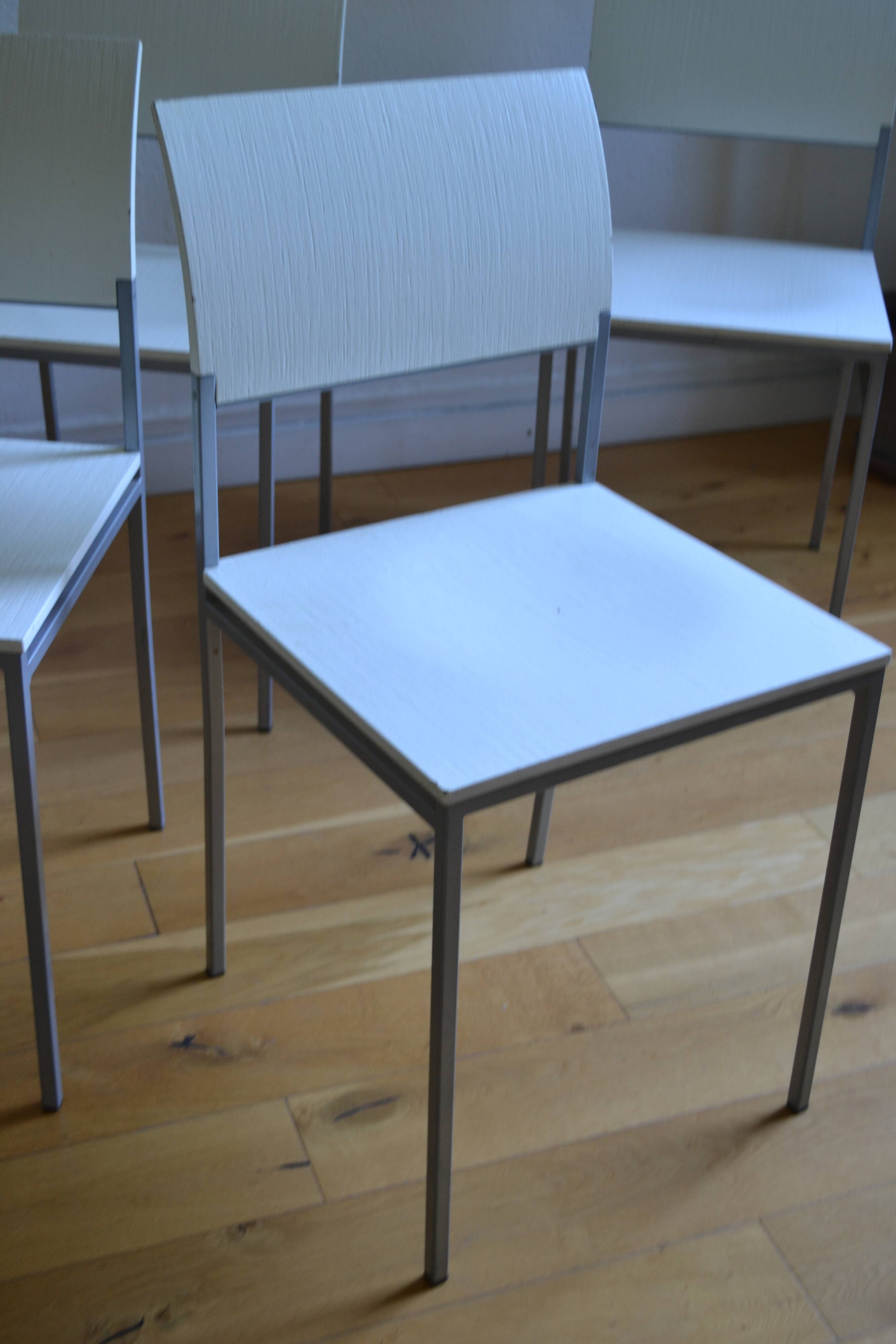 Set of 4 vintage metal and wood chairs from the 1990s.