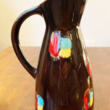 Set of three ceramic pitchers