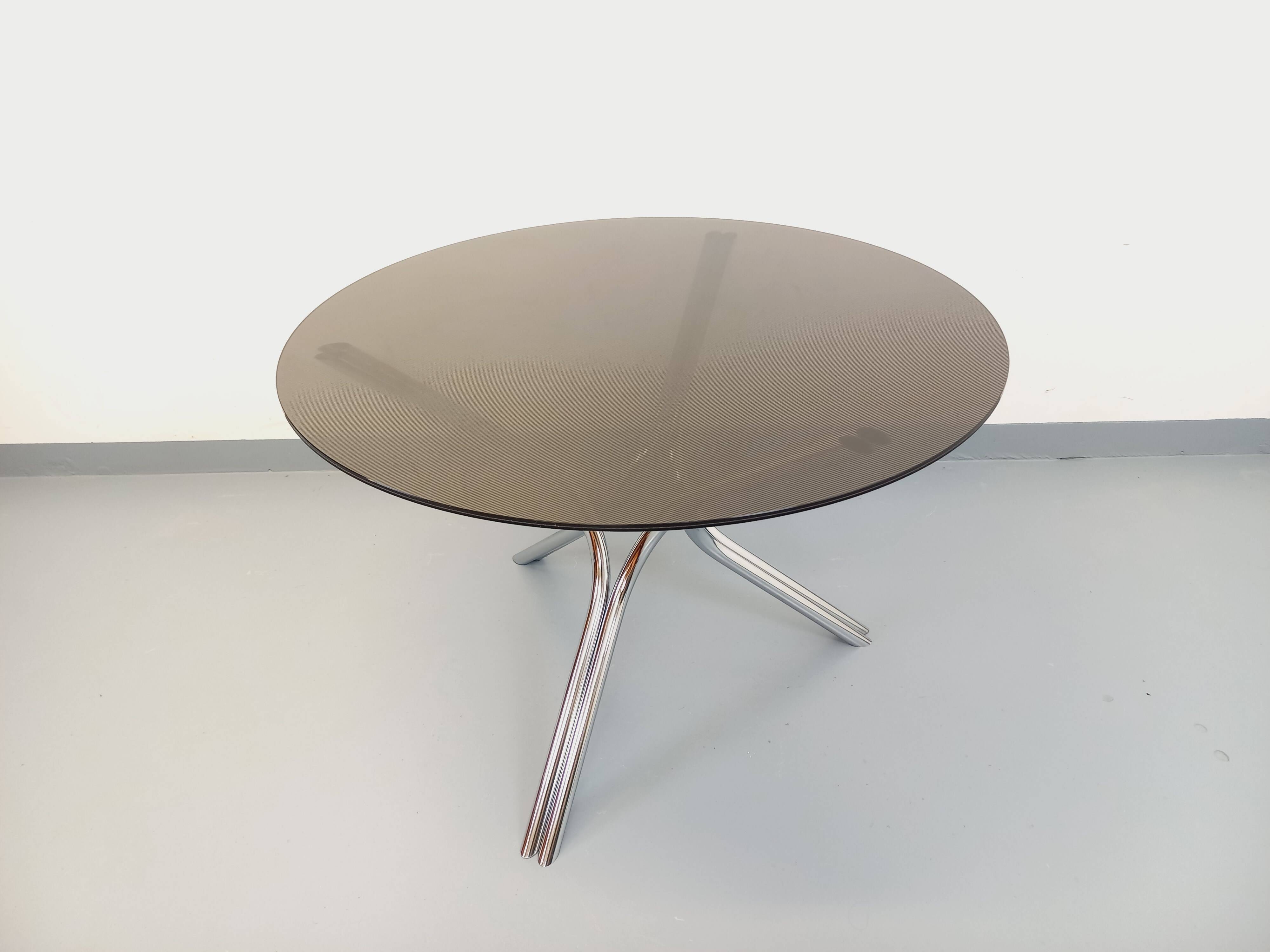 Vintage dining table in smoked glass plexiglass and chrome metal.