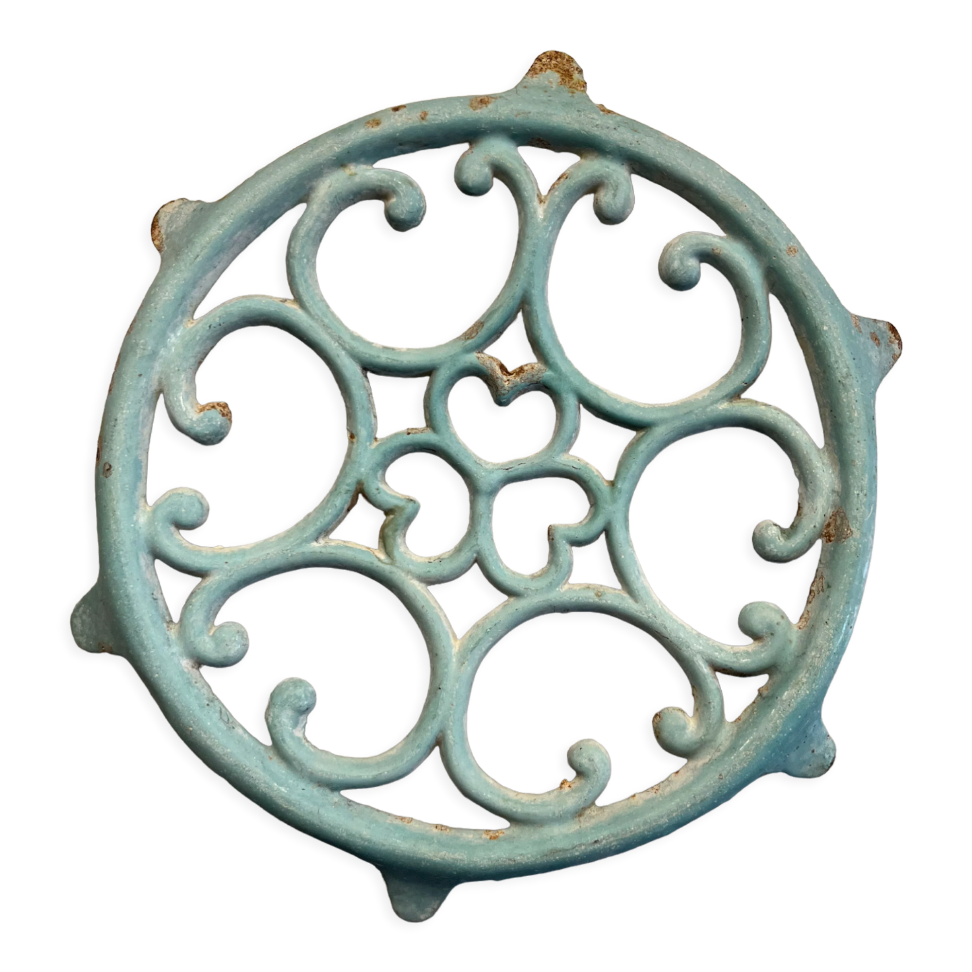 Old cast iron trivety turquoise