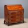 Antique drop-leaf table in walnut with maple inlays, Italy, 20th century.