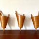 Large wood veneer wall light on the right, 1980.