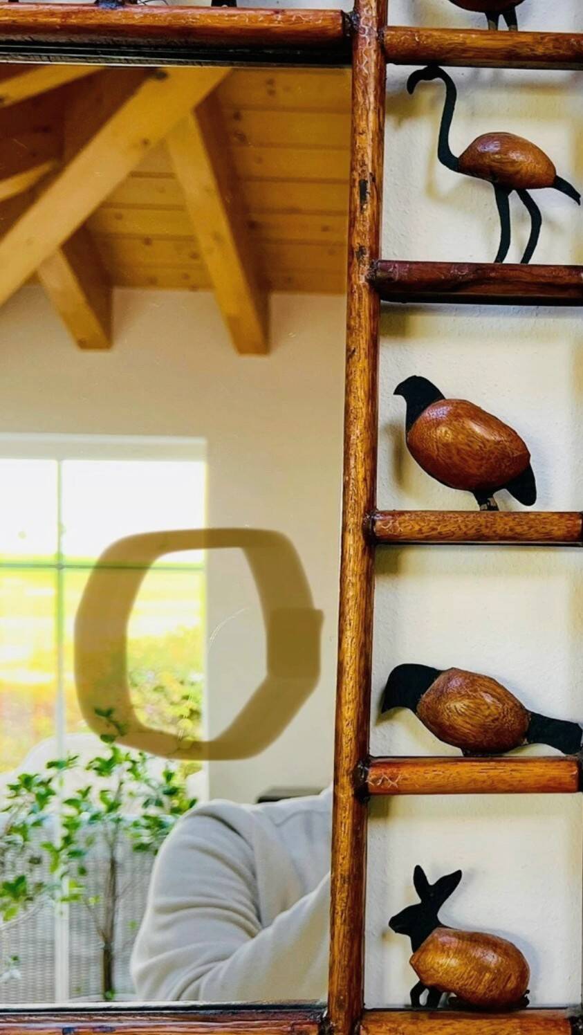 Wrought iron wood animal mirror